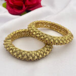 Antique Gold Bangles with Ruby Stone Detailing Traditional Indian Design