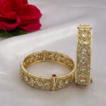 Kundan Bangles with White Enamel & Carrot Polish Finish