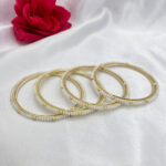 Elegant Gold Polish Pearl Bangles – Set of 4