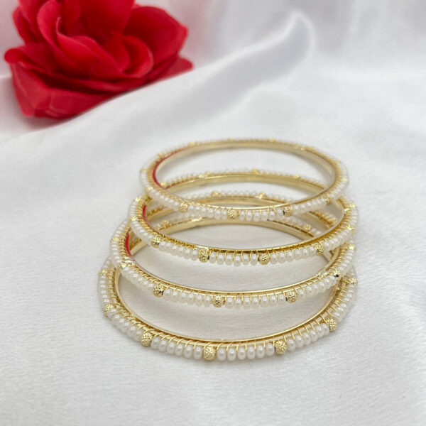 Elegant Gold Polish Pearl Bangles – Set of 4